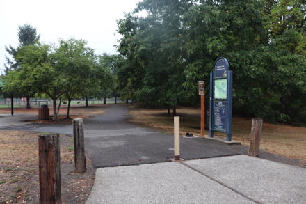 Sidewalk from Klineline Ponds to the sports complex and Salmon Creek Greenway trail – sign with map and information